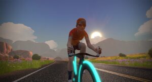 A cyclist in a red and orange jersey rides a bicycle with glowing teal wheels along a paved road through a desert landscape at sunrise.