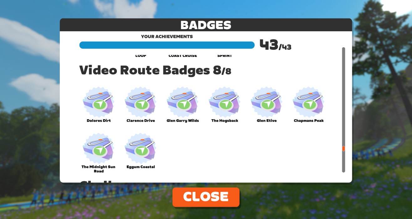 Video game achievements screen showing a 43/43 completion count and a grid of eight earned Video Route Badges with their names: Dolores Dirt, Clarence Drive, Glen Garry Wilds, The Hogsback, Glen Etive, Chapmans Peak, The Midnight Sun Road, and Eggum Coastal.