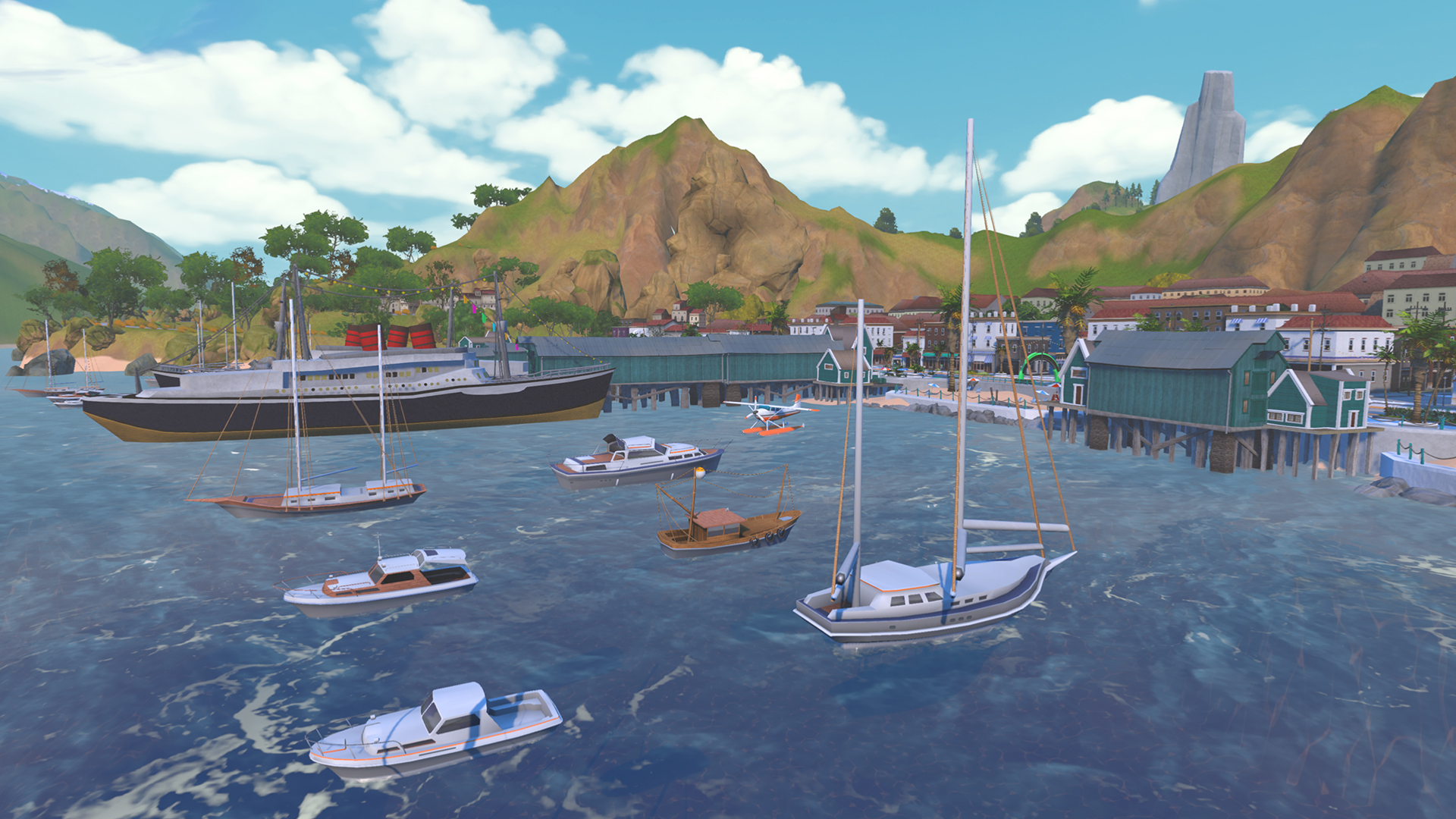Various boats and a large steamship docked at a wooden pier in a coastal town with mountains in the background.