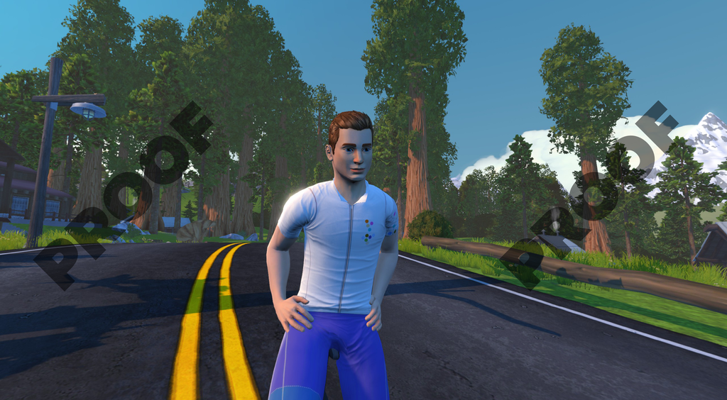A cyclist in a white jersey and blue shorts stands on a road with yellow lines in a forest setting.